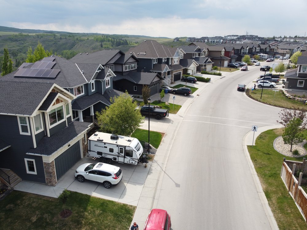 Ariel photo about 10m off the ground of a suburban neighbourhood in Cochrane Alberta.